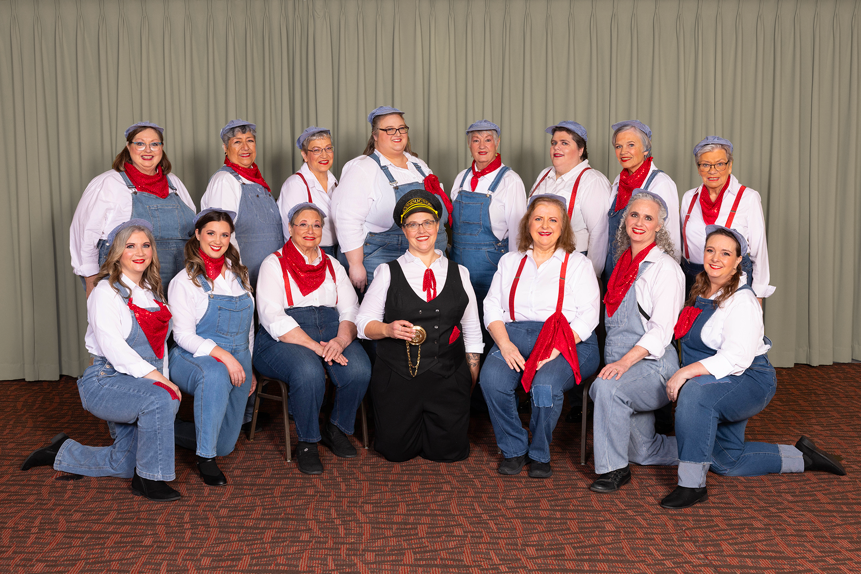 15 members of Lone Star Chorus in engineer outfits for the 2025 Region 10 competition